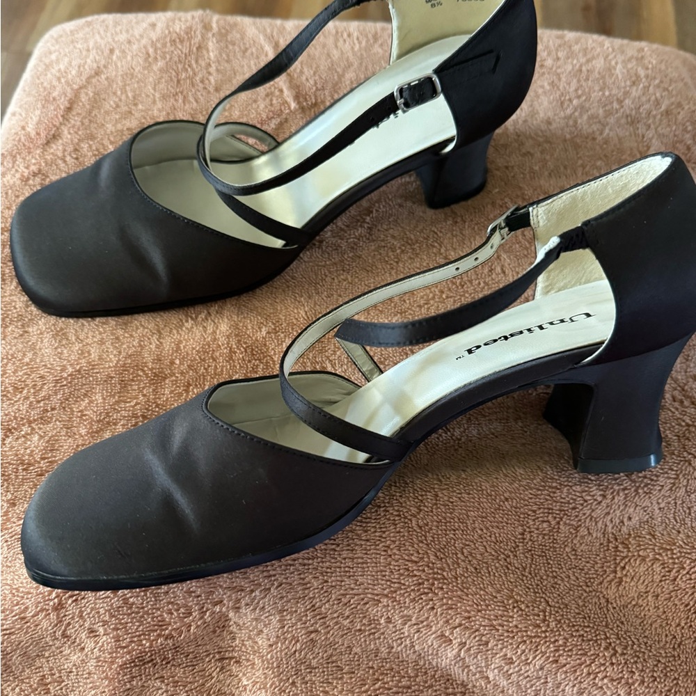 Unlisted black heel